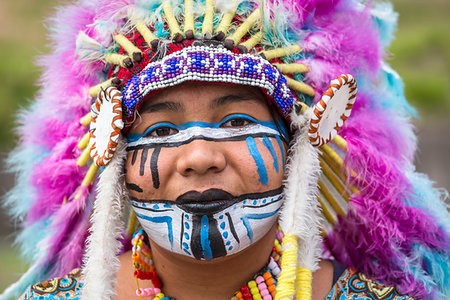 simsearch:862-06540939,k - Close-up of Indigenous tribal dancer wearing colorful headdress at a St Michael Archangel Festival parade in San Miguel de Allende, Mexico Stock Photo - Rights-Managed, Code: 700-09227072