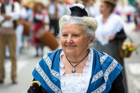 provence-alpes-cote d'azur - Woman in the Parade of the Cart, Saint-Rémy-de-Provence, Provence-Alpes-Côte d'Azur, Bouches-du-Rhône, Provence, France. Stock Photo - Rights-Managed, Code: 700-09236629