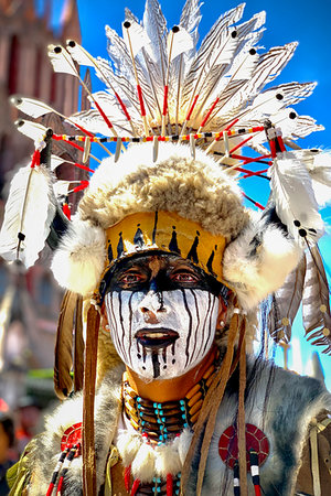 Close-up portrait of a male, indigenous tribal dancer wearing face paint and a white feather headdress at a St Michael Archangel Festival parade in San Miguel de Allende, Mexico Photographie de stock - Rights-Managed, Code: 700-09273279