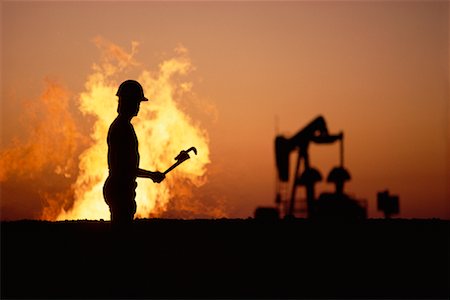 Silhouette d'ouvrier Oilfield Photographie de stock - Rights-Managed, Code: 700-00008085