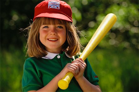 Young Girl Holding Baseball Bat Stock Photo - Rights-Managed, Code: 700-00008740