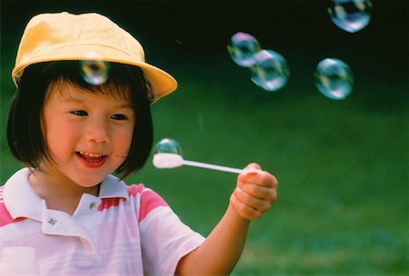 simsearch:700-00033360,k - Young Girl Blowing Bubbles Stock Photo - Rights-Managed, Code: 700-00003363