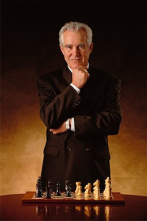 simsearch:700-00075674,k - Portrait of Mature Businessman With Chess Board Stock Photo - Rights-Managed, Code: 700-00015293