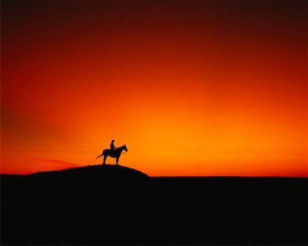 saskatchewan silo photos - Silhouette of Man on Horse at Sunset, Grasslands National Park Saskatchewan, Canada Stock Photo - Rights-Managed, Code: 700-00015363