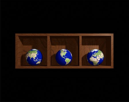 Three Globes on Shelf, Displaying Continents of The World Stock Photo - Rights-Managed, Code: 700-00017609