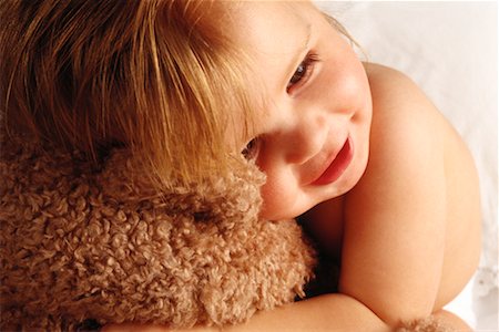 simsearch:700-00554038,k - Baby Hugging Stuffed Toy Stock Photo - Rights-Managed, Code: 700-00017992