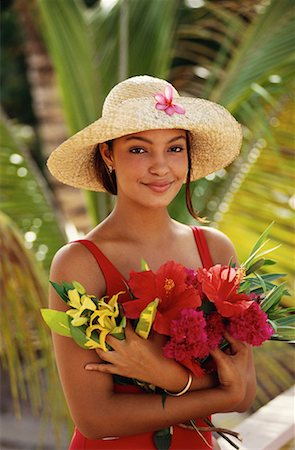 saint martin caribbean - Portrait of Woman Holding Flowers St. Martin, Carribean Stock Photo - Rights-Managed, Code: 700-00018332