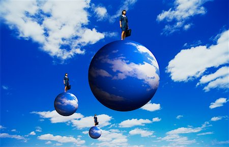 simsearch:700-00042054,k - Businesswomen Standing on Spheres In Sky with Clouds Stock Photo - Rights-Managed, Code: 700-00018450