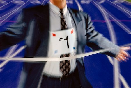 simsearch:700-03587233,k - Businessman Crossing Finish Line Stock Photo - Rights-Managed, Code: 700-00018507