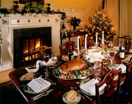 Christmas Dinner on Dining Table Near Fireplace Stock Photo - Rights-Managed, Code: 700-00019810