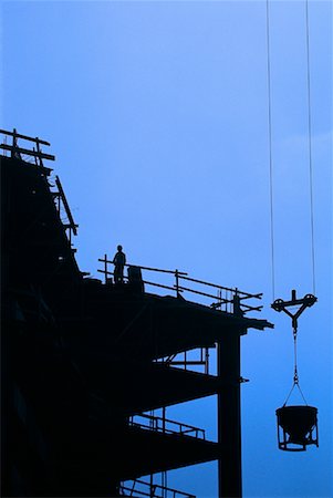 pourer - Silhouette of Worker and Construction Site at Sunset Stock Photo - Rights-Managed, Code: 700-00011286