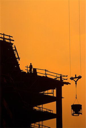 pourer - Silhouette of Building Construction at Sunset Stock Photo - Rights-Managed, Code: 700-00011287