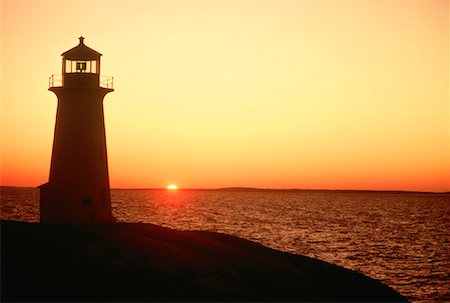 simsearch:700-02669459,k - Silhouette of Lighthouse at Sunset Peggy's Cove, Nova Scotia, Canada Stock Photo - Rights-Managed, Code: 700-00012905