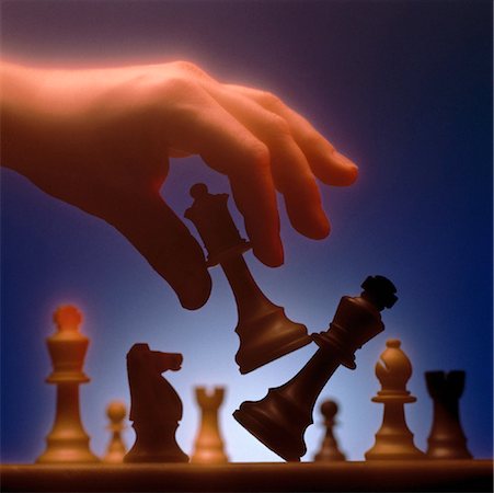 simsearch:700-00075674,k - Hand Moving Chess Pieces Stock Photo - Rights-Managed, Code: 700-00013911