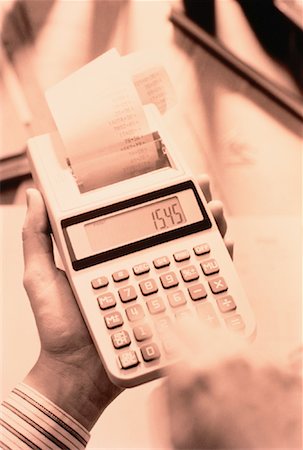 register tape - Hands Using Adding Machine Stock Photo - Rights-Managed, Code: 700-00024845