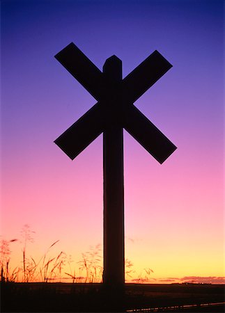 Silhouette of Railway Crossing at Dusk Alberta, Canada Stock Photo - Rights-Managed, Code: 700-00025328