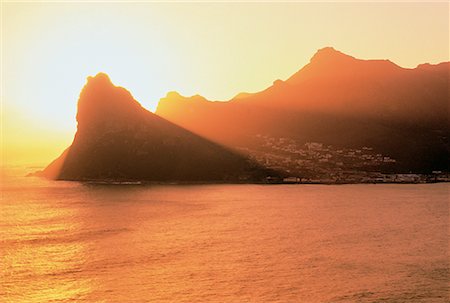 sentinel - Silhouette of Coast at Sunset The Sentinel, Hout Bay South Africa Stock Photo - Rights-Managed, Code: 700-00025844