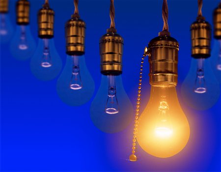 simsearch:700-00453204,k - Hanging Light Bulbs with Single Glowing Light Bulbs Stock Photo - Rights-Managed, Code: 700-00028233