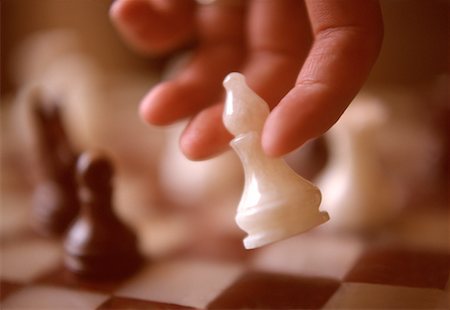 simsearch:700-00075674,k - Close-Up of Hand Moving Chess Piece Stock Photo - Rights-Managed, Code: 700-00028726