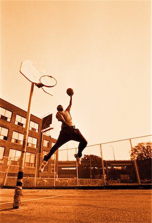 simsearch:700-00060777,k - Man Playing Basketball Outdoors Stock Photo - Rights-Managed, Code: 700-00029263
