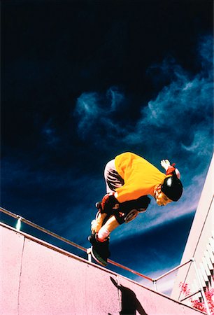 simsearch:400-05737917,k - Skateboarder on Halfpipe Stock Photo - Rights-Managed, Code: 700-00029499