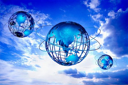 simsearch:700-00280293,k - Three Globes with Rings Displaying Continents of the World in Sky Stock Photo - Rights-Managed, Code: 700-00029511