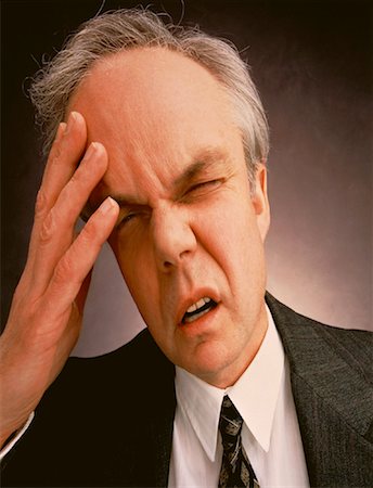 simsearch:700-00088934,k - Portrait of Mature Businessman With Headache Stock Photo - Rights-Managed, Code: 700-00020726