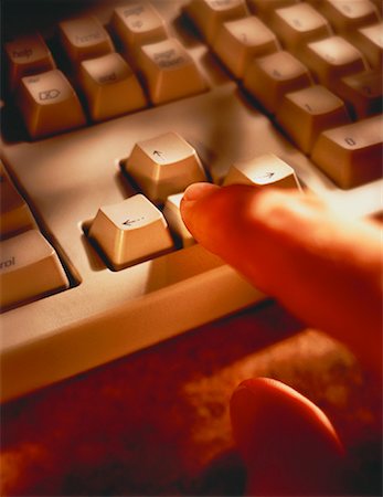 simsearch:700-00284729,k - Close-Up of Hand on Computer Keyboard Stock Photo - Rights-Managed, Code: 700-00020800