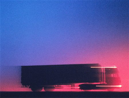 simsearch:700-00068576,k - Blurred Transport Truck on Road At Sunset Stock Photo - Rights-Managed, Code: 700-00021021