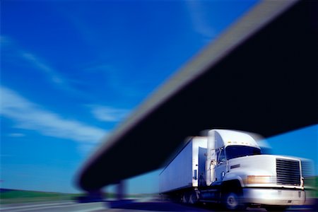 simsearch:700-00068576,k - Blurred View of Transport Truck On Highway Stock Photo - Rights-Managed, Code: 700-00021264