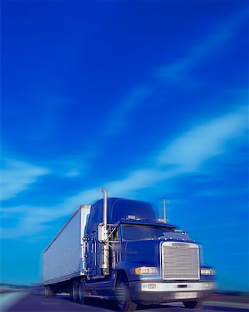 simsearch:700-00068576,k - Blurred View of Transport Truck And Sky Stock Photo - Rights-Managed, Code: 700-00021265