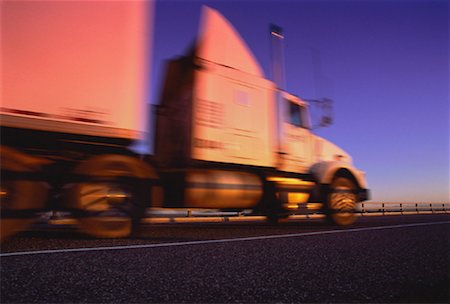 simsearch:700-00068576,k - Blurred Transport Truck at Sunset Stock Photo - Rights-Managed, Code: 700-00021788