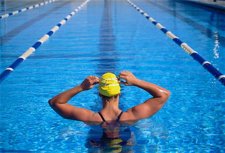 simsearch:700-00091923,k - Back View of Female Swimmer Standing in Swimming Pool Stock Photo - Rights-Managed, Code: 700-00021816