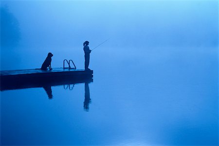 simsearch:700-00035311,k - Fille sur le quai de pêche avec chien Kennisis Lake, Haliburton (Ontario), Canada Photographie de stock - Rights-Managed, Code: 700-00022523