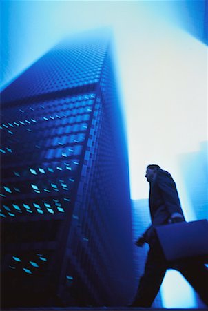 simsearch:700-00082181,k - Businessman Walking near Office Tower Stock Photo - Rights-Managed, Code: 700-00022623