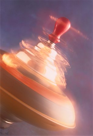 simsearch:700-00618429,k - Close-Up of Spinning Top Stock Photo - Rights-Managed, Code: 700-00023138
