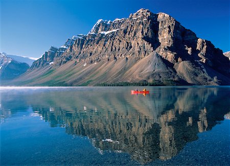 simsearch:600-06125581,k - Canoeing on Bow Lake, Crowfoot Mountain, Banff National Park Alberta, Canada Stock Photo - Rights-Managed, Code: 700-00023477