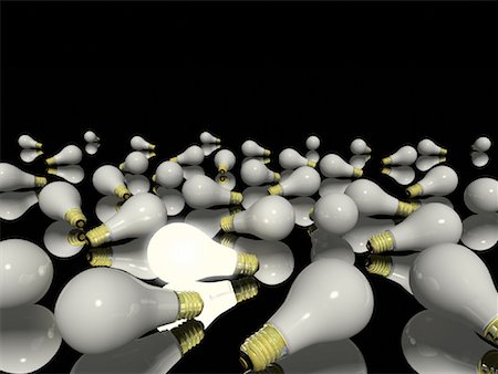 simsearch:700-00453204,k - Light Bulbs Scattered on Floor With Single Glowing Light Bulb Stock Photo - Rights-Managed, Code: 700-00023491