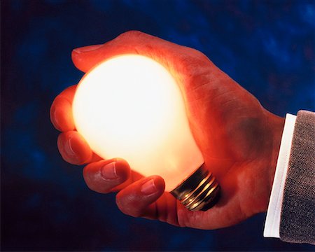 simsearch:700-00453204,k - Hand Holding Glowing Lightbulb Stock Photo - Rights-Managed, Code: 700-00023846
