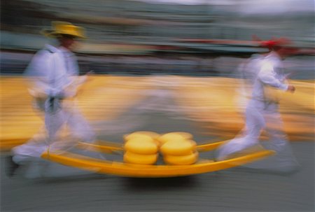 Men Carrying Cart in Cheese Market Alkmaar, The Netherlands Stock Photo - Rights-Managed, Code: 700-00023893