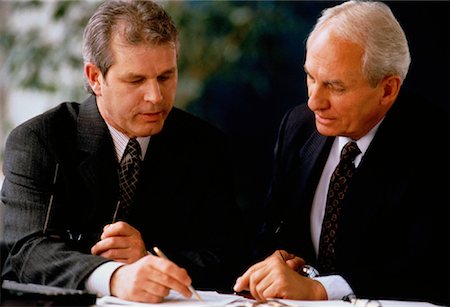 Two Mature Businessmen in Meeting Stock Photo - Rights-Managed, Code: 700-00034995