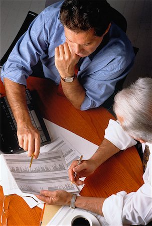 Overhead View of Two Businessmen Working with Laptop Computer Stock Photo - Rights-Managed, Code: 700-00035042