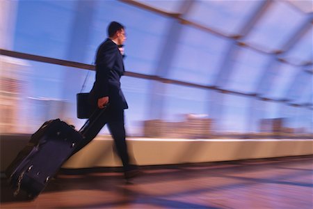 simsearch:700-03058969,k - Businessman Walking in Terminal Calgary, Alberta, Canada Stock Photo - Rights-Managed, Code: 700-00035126