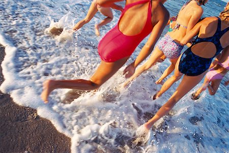 simsearch:700-00020587,k - Back View of Girls in Swimwear Running on Beach Stock Photo - Rights-Managed, Code: 700-00036455