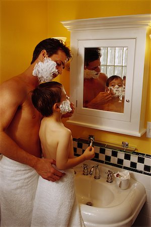 son looking mirror father - Father and Son Shaving Foto de stock - Con derechos protegidos, Código: 700-00036950