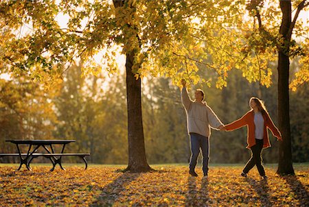 Couple Walking through Park in Autumn Stock Photo - Rights-Managed, Code: 700-00037093
