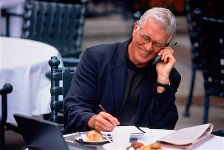 simsearch:700-00163379,k - Mature Businessman Using Cell Phone at Outdoor Cafe Stock Photo - Rights-Managed, Code: 700-00037321