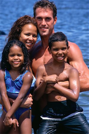 simsearch:700-00041478,k - Portrait of Family in Swimwear on Beach Stock Photo - Rights-Managed, Code: 700-00038076