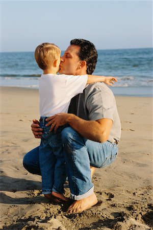 simsearch:700-00865209,k - Father and Son Embracing on Beach Stock Photo - Rights-Managed, Code: 700-00038640