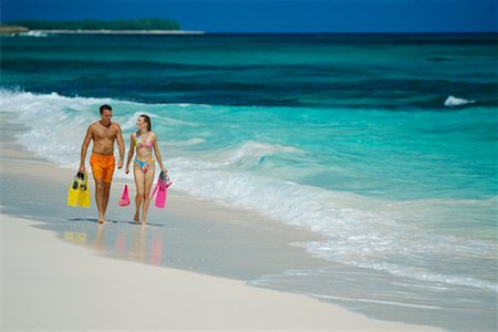 snorkeler (male) - Couple in Swimwear, Walking on Beach Carrying Flippers Stock Photo - Rights-Managed, Code: 700-00039312